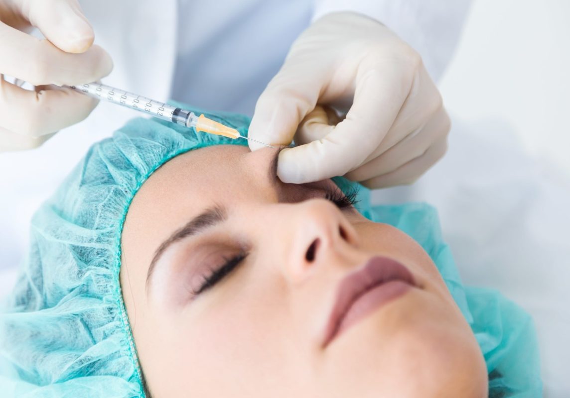 beautiful-young-woman-getting-botox-cosmetic-injection-her-face (1)-min