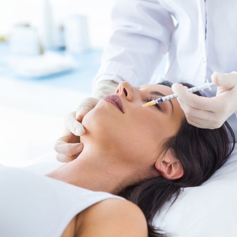 beautiful-young-woman-getting-botox-cosmetic-injection-her-face-min beautiful-young-woman-getting-botox-cosmetic-injection-her-face-min