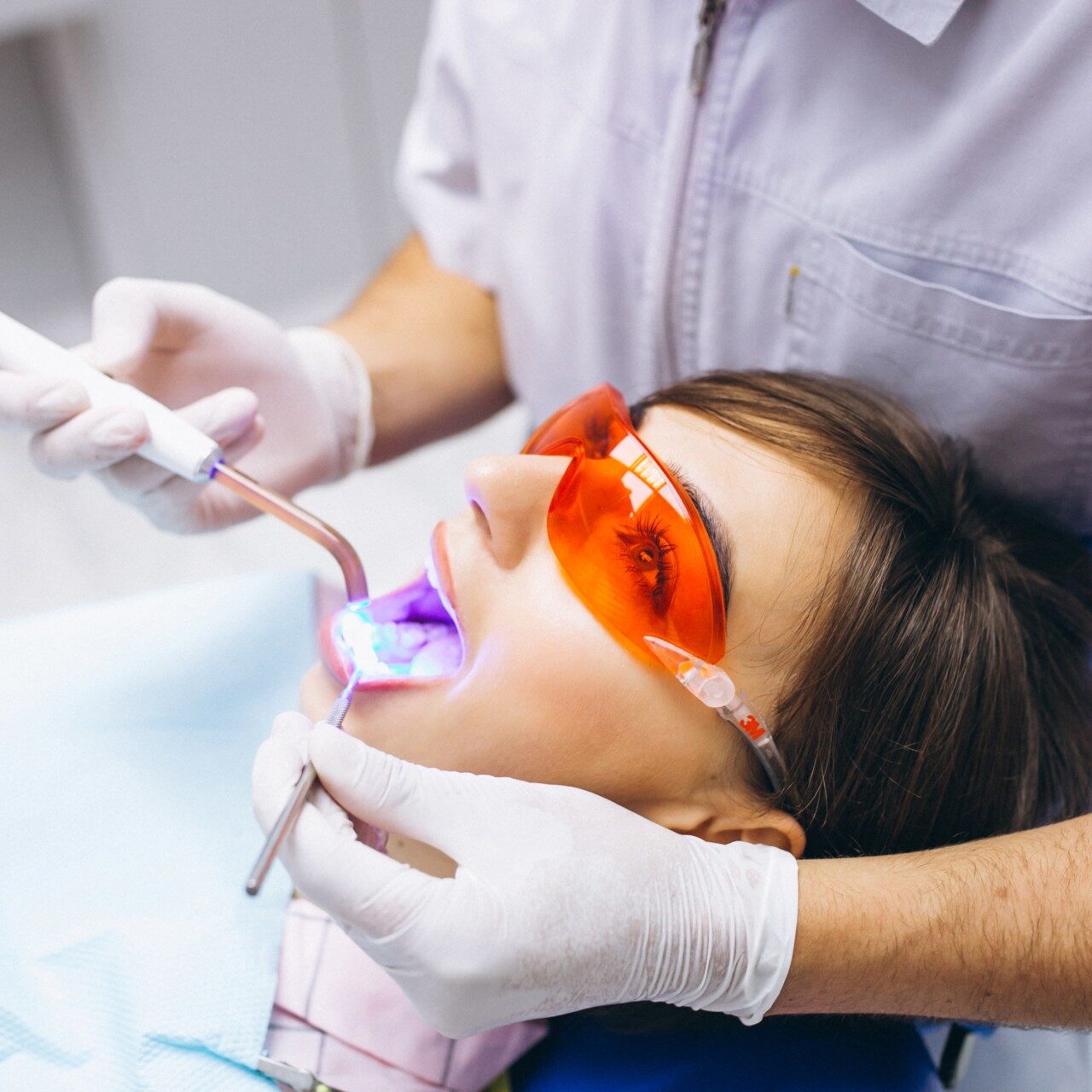 woman-patient-at-dentist-min